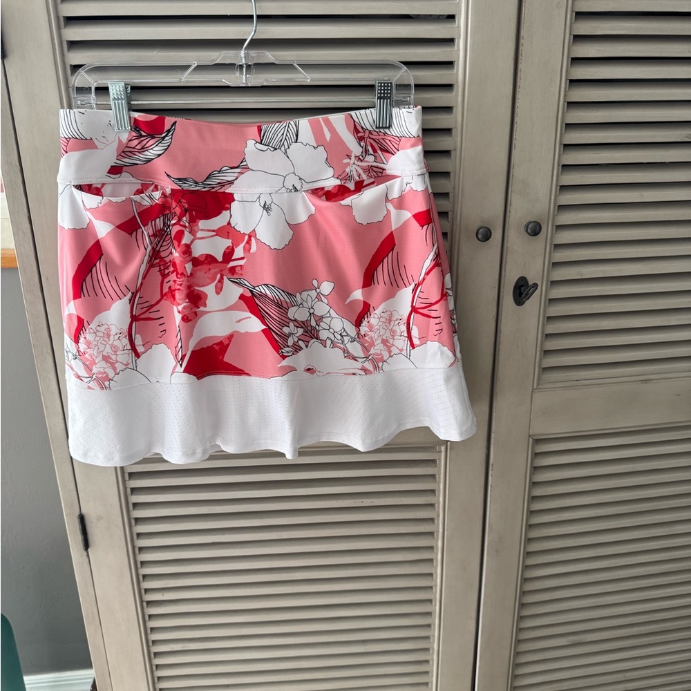Orange and white floral golf skirt